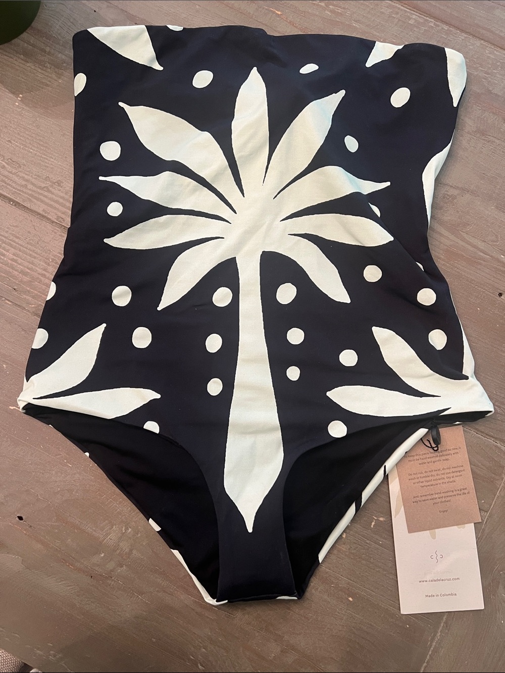 Cala De La Cruz Alison- Black & White Palm-Print Strapless One-Piece Swimsuit
